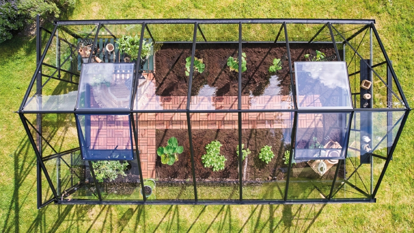 Aerial view of the Halls ICON 8 8x14 Greenhouse, with toughened glass and a powder-coated black aluminium frame.