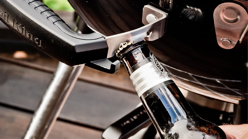 Integrated bottle opener on handle of Broil King Crown Charcoal Kettle BBQ 47cm outdoor grill