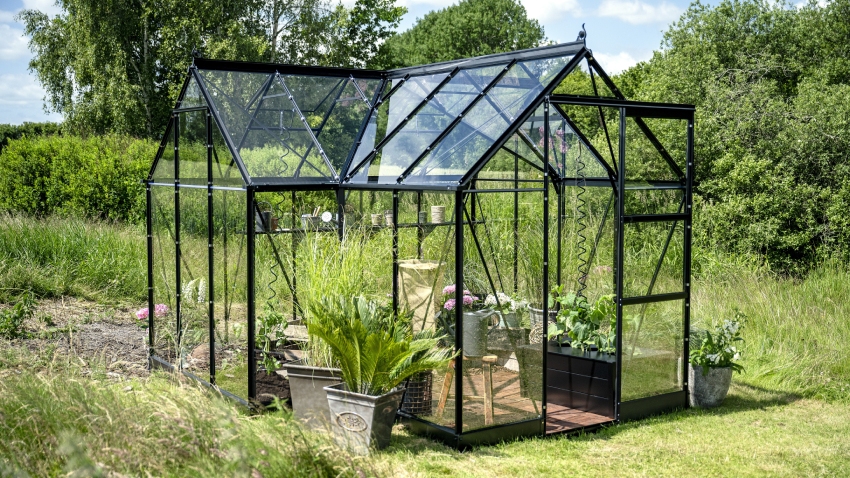 Halls ICON 6 6x10 Gardenhouse black frame with 3mm toughened glass, wide side door open showing interior planting space