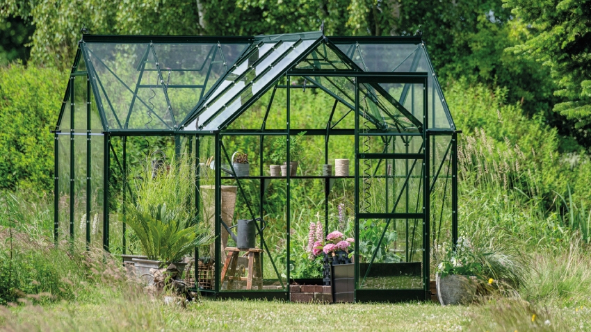 Halls ICON 6 6x10 Gardenhouse green frame with 3mm toughened glass revealing the extensive interior planting space