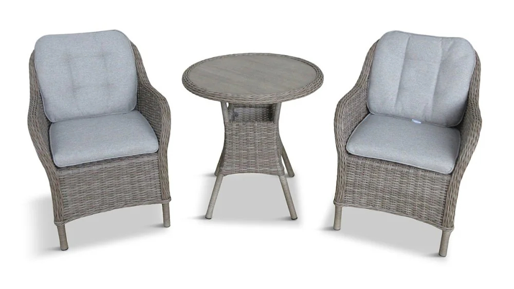 Leisure Grow St Tropez Sand 2 seat garden dining set with round table and two wicker armchairs, shown on a white background with padded cushions.
