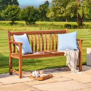 Wide-Angled Shot of the Alexander Rose Redcliffe Broadfield Bench 5ft 335R - Shown Styled in a Manicured Garden