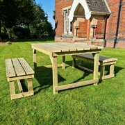 Butchers table set in a garden environment - full image
