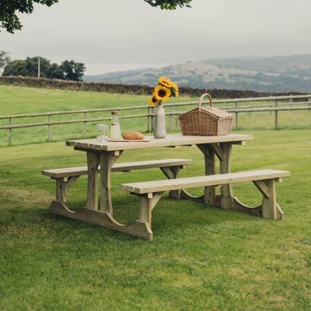 Churnet Valley Lunar Wooden Walk-In Picnic Table 150cm PT107 in a garden environment overseeing the nice views, set up for a picnic