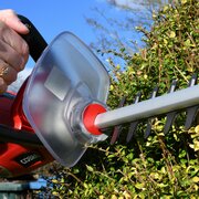 HT550E Hedgetrimmer close up of the hedge being trimmed by the HT550E