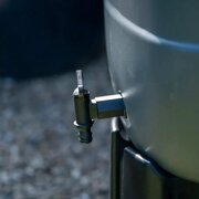 Close-up of the tap on the Halls 100L Mini Rainsaver water butt for controlled water use.