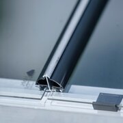 Close-up of the Halls ICON 6 6x6 greenhouse capping for toughened glass, showing how the capping secures the glass panel to the aluminium frame.