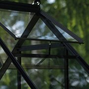 Open roof window vent on the Halls Icon 6 6x6 greenhouse, showing toughened glass panels and black aluminium frame.