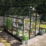 Halls Icon 6 6x8 greenhouse in black with toughened glass, shown as a freestanding garden greenhouse. Pre-order and save £307.