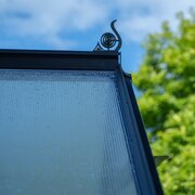 Roofline view of the Halls ICON 6 6x8 greenhouse capping for polycarbonate, securing the polycarbonate roof panels within the aluminium frame.