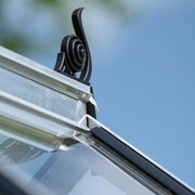 Close-up of Halls ICON Gardenhouse 6 6x10 greenhouse capping HR91020, showing the rubber seal and external capping profile holding the toughened glass.