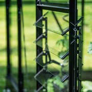 Side view of the black Halls ICON louvre kit showing the opening mechanism and glass louvre blades in use.