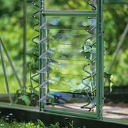 Open louvre vents on a Halls ICON greenhouse allowing controlled airflow at plant height.