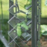 Close-up of aluminium and toughened glass louvre blades on a Halls ICON greenhouse ventilation panel.