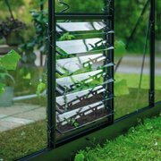 Halls ICON planthouse and lean-to louvre kit in black, installed in side wall and showing plant-level ventilation panel in use.