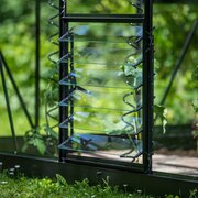 Open louvre vents on a powder-coated black Halls ICON planthouse, allowing controlled airflow at plant height.
