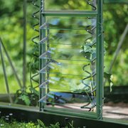 Open louvre vents on a Halls ICON lean-to, allowing controlled airflow at plant height.