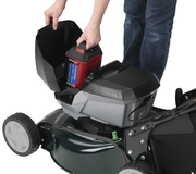Hayter Osprey 46 cordless lawnmower battery compartment with removable 60V lithium-ion battery installed beneath the protective cover.