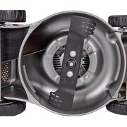 Underside view of the Honda HRG 466 XB cordless lawnmower showing the pressed-steel cutting deck and single rotary blade.