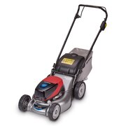 Honda HRG 466 XB cordless self-propelled lawnmower with grass collector attached, shown from a front-angle view.