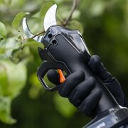 Close-up of Husqvarna Aspire PS30X-P4A secateurs making a precise pruning cut