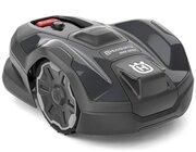 Husqvarna Automower305E NERA robotic lawn mower with EPOS plug-in accessory shown alongside the mower.