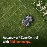 Husqvarna Automower 405X robotic lawnmower using AIM zone control to create virtual mowing areas and stay-out zones on a lawn