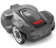 Angled view of Husqvarna Automower 405X robotic lawnmower showing cutting deck housing and rugged drive wheels