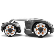 Side profile of Husqvarna Automower 435X AWD robotic lawnmower showing articulated chassis for steep slopes and uneven terrain