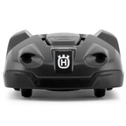 Front view of Husqvarna Automower 450X robotic lawnmower showing compact body and collision sensors