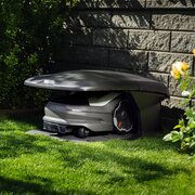Husqvarna Automower House Large installed over EPOS robotic mower on lawn, designed for 535 AWD EPOS, 540 EPOS, 560 EPOS and 580 EPOS models, protecting from rain and sun