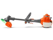 Side view of the Husqvarna Toy Grass & Weed Trimmer 546276501 with illuminated rotating trimmer head