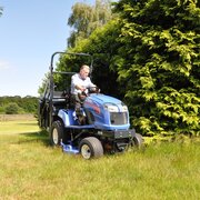 Iseki SXG324 diesel ride-on mower collecting grass clippings while maintaining large lawns and estate grounds.