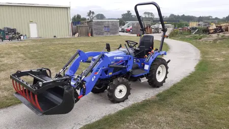 Iseki TM3267HST Diesel Compact Tractor With Loader and Multi-Use Bucket (Ex Demo) - image 1