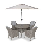 LG St Tropez Sand 4 Seat Garden Dining Set with round table, four cushioned armchairs and 2.5m parasol, shown on a white background.