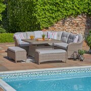 LG St Tropez Sand large square modular sofa set with casual dining table arranged outdoors beside a swimming pool