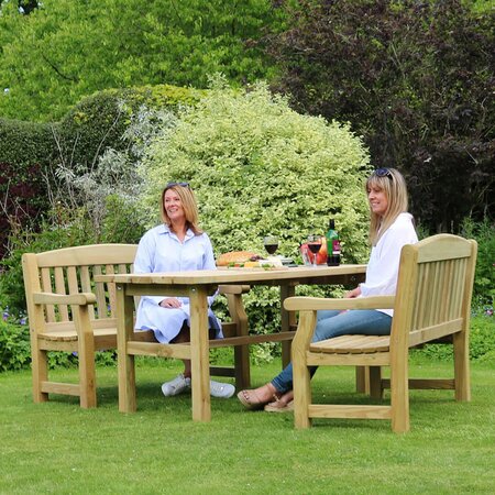 Emily 4 Seater Dining Set with two women sat down laughing