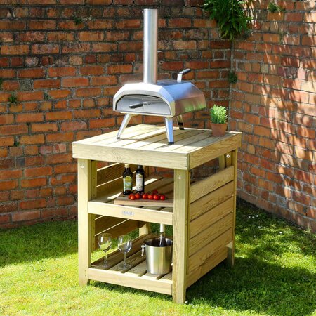 Garden Pizza Oven Table with pizza oven and condiments on top of it