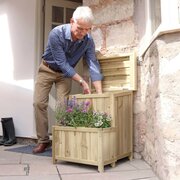 Parcel Store with Planter and a man collecting his parcel from it